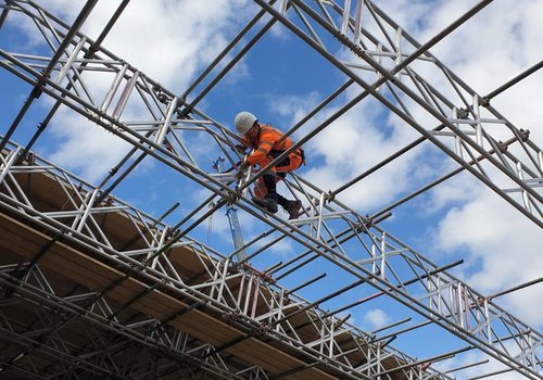 Worker on scaffolding